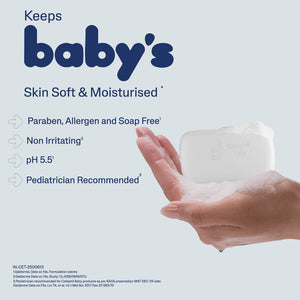 Baby soap bar with hand holding it, labeled for keeping baby's skin soft and moisturized. Cetaphil Baby Mild Bar 100g go littles product main image 7