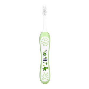Green children's toothbrush with a visible brand logo on a white background. Chicco Toothbrush Green 6M to 36M go littles product main image