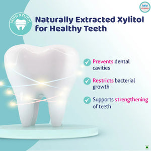 Tooth model with Xylitol benefits on a light blue background. Chicco Toothpaste Strawberry Flavor 12 M to 6y 50 g go littles product image 7