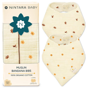 Nintara Baby muslin bandana bibs with packaging on a white background. Nintara Baby Bandana Bibs Set of 2 Golden Flutter Pack go littles product main image