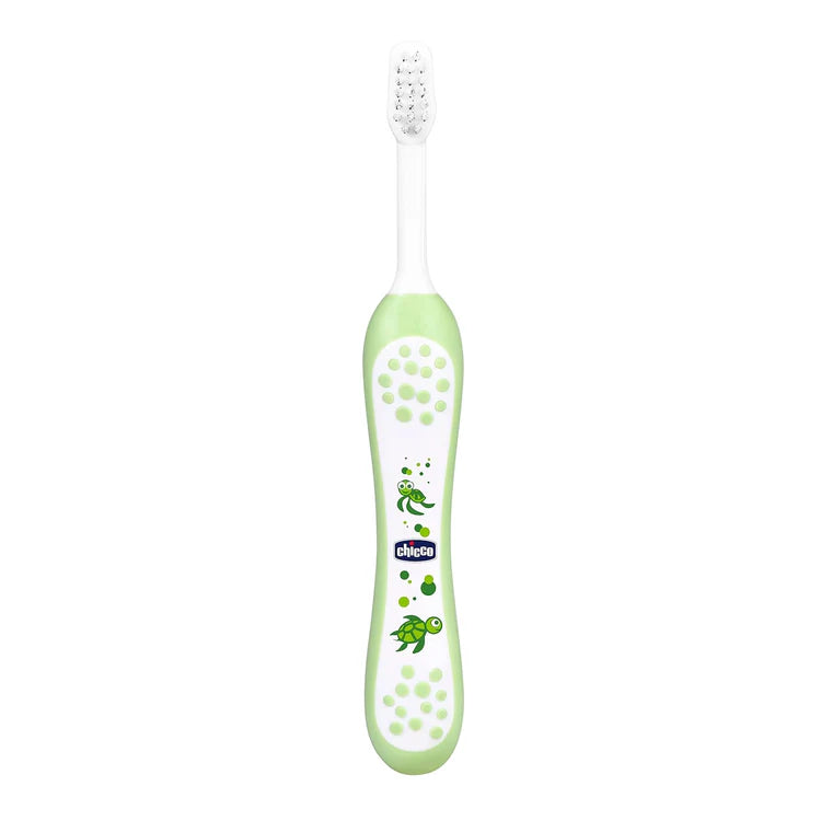 Green children's toothbrush with a visible brand logo on a white background. Chicco Toothbrush Green 6M to 36M go littles product main image