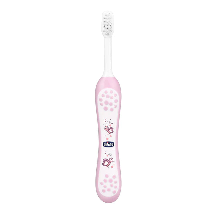 Pink children's toothbrush with brand logo on a white background. chicco Toothbrush Pink 6M to 36M go littles product main image 